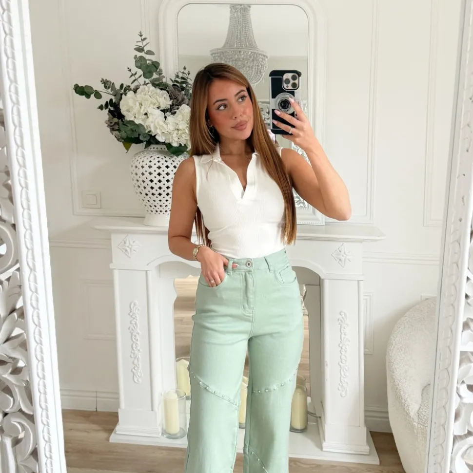 JEAN VERT PASTEL CLOUTÉ