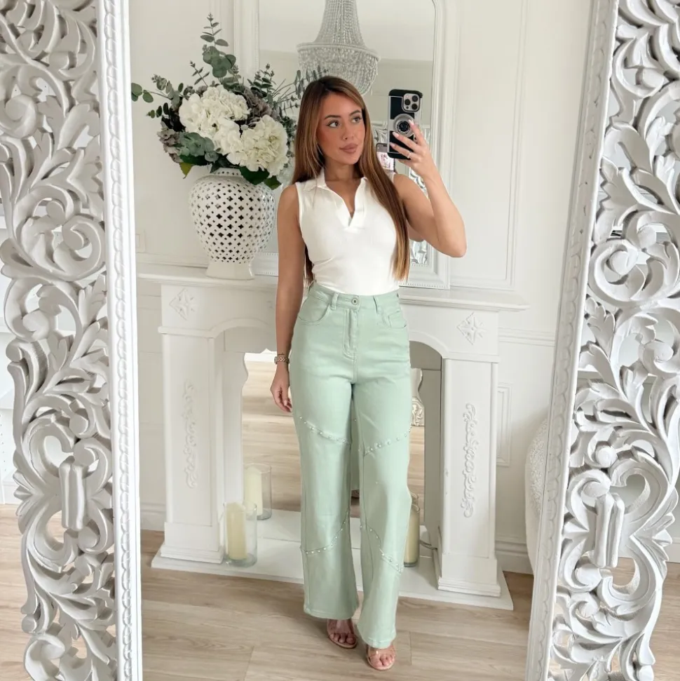 JEAN VERT PASTEL CLOUTÉ