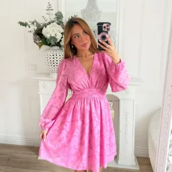 ROBE FUSHIA MOTIFS EN RELIEF